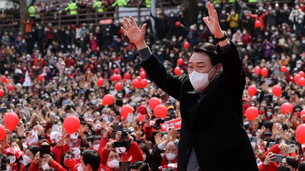 South Koreans vote for president in tight, bitter election