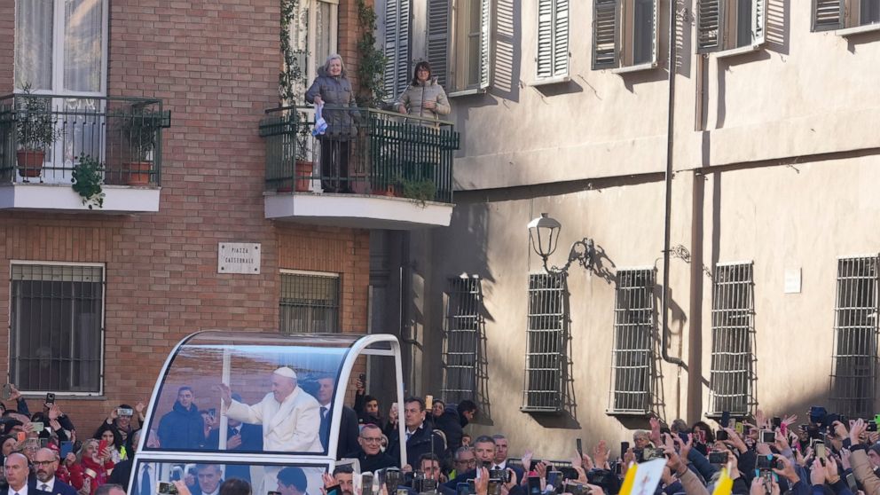 Pope Francis arrives to preside over the holy mass in the Cathedral of Asti, northern Italy, Sunday, Nov. 20, 2022, to meet the diocesan community from which his parents had left to emigrate to Argentina and the young people from all over the region 