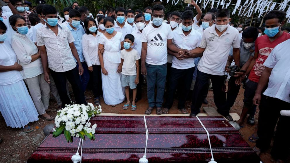 Man lynched in Pakistan buried in native Sri Lanka