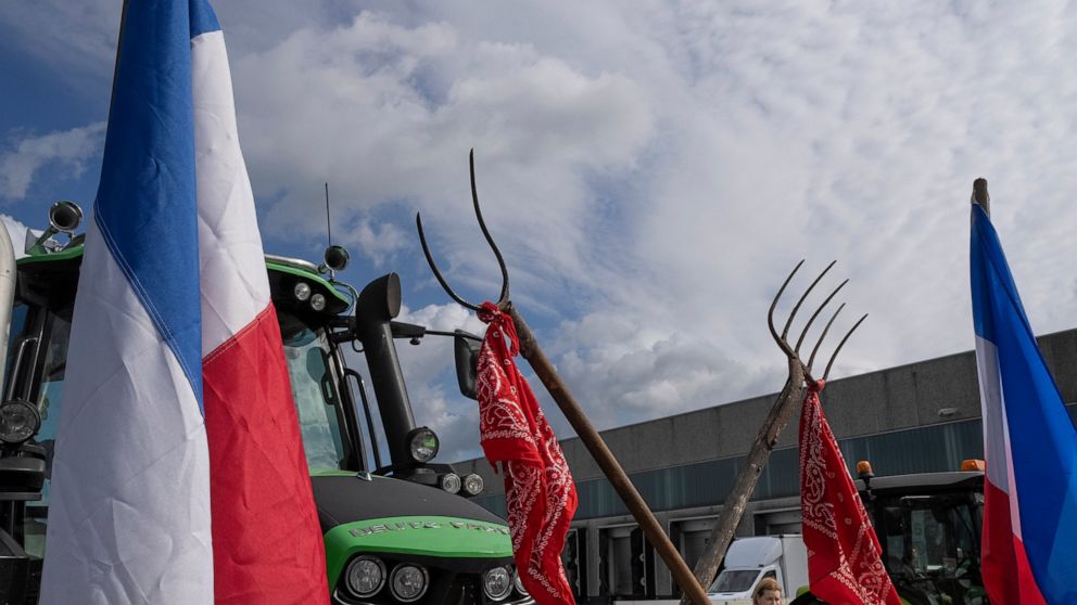 FILE- Some 25 tractors were used to blockade a distribution center for supermarket chain Albert Heijn in the town of Zaandam, just north of Amsterdam, Monday, July 4, 2022. Representatives of Dutch farmers were meeting Friday, Aug. 5, 2022 with Prime