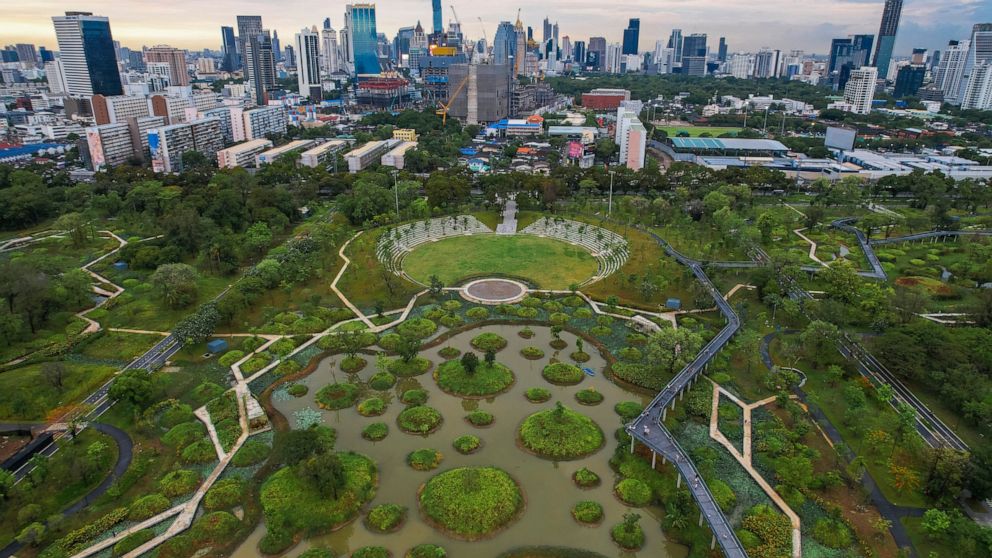 An aerail view shows the water features of Benjakitti Park in Bangkok, Thailand, Sunday, May 8, 2022. Thailand's bustling, congested capital Bangkok has a new park, an oasis of green that is part of a drive to bring shade, peace and quiet to a hot an