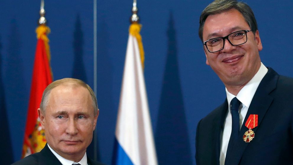 FILE- Russian President Vladimir Putin, left, poses with Serbian President Aleksandar Vucic after being awarded the Order of Alexander Nevsky in Belgrade, Serbia, Thursday, Jan. 17, 2019. Vucic said he has secured an "extremely favorable" gas deal wi