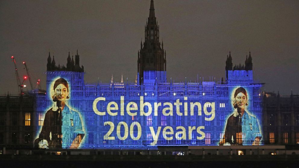 An image of Florence Nightingale is projected on the Houses of Parliament in Westminster, London, on International Nurses Day and to mark the 200th anniversary of the birth of the nurse, Tuesday, May 12, 2020. Historians have praised Florence Nightin