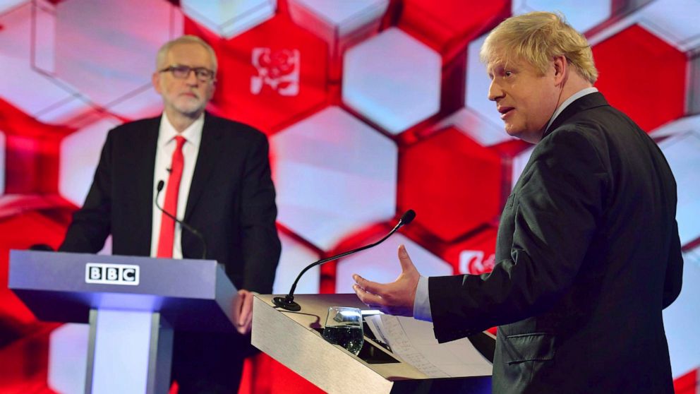 Opposition Labour Party leader Jeremy Corbyn, left, and Britain's Prime Minister Boris Johnson, during a head to head live Election Debate at the BBC TV studios in Maidstone, England, Friday Dec. 6, 2019. Britain's Brexit is one of the main issues fo