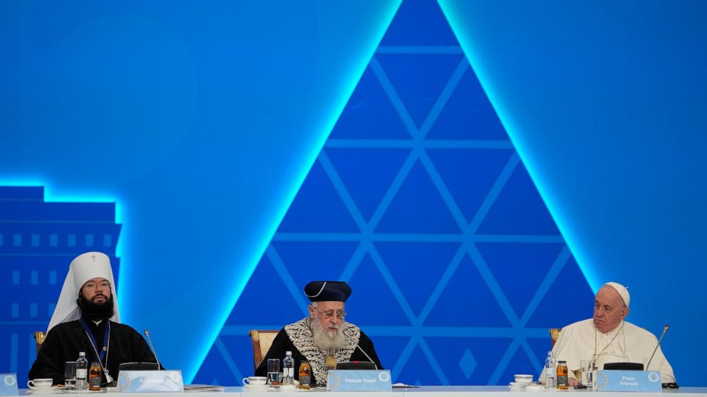 Pope Francis, right, and Metropolitan Anthony, in charge of foreign relations for the Russian Orthodox Church, left, listen to Sephardi Chief Rabbi of Israel, Yitzhak Yosef speaking at the '7th Congress of Leaders of World and Traditional Religions, 