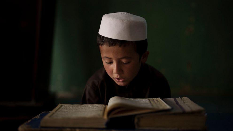 AP PHOTOS: Life in a madrasa as Afghanistan enters new era