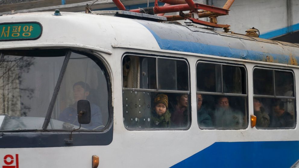 In this Sunday, Feb. 3, 2019 photo, people ride on a tram in Pyongyang, North Korea. Pyongyang is upgrading its overcrowded mass transit system with brand new subway cars, trams and buses in a campaign meant to show leader Kim Jong Un is raising the 