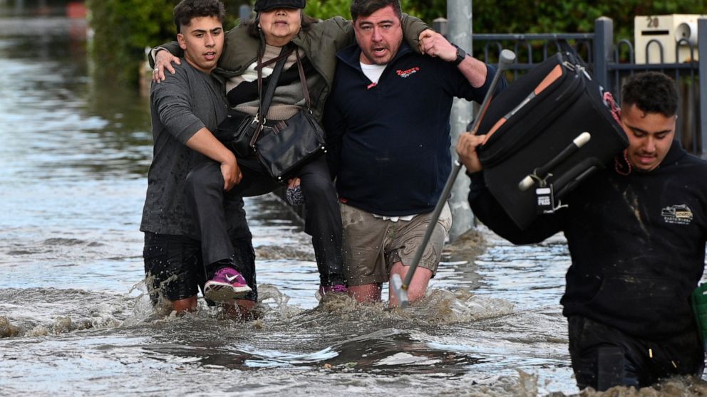 Homes inundated by swollen rivers in Australian floods