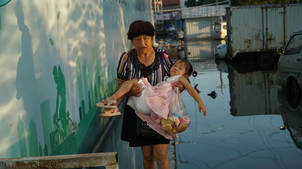 China flooding brought fear, then washed away livelihoods