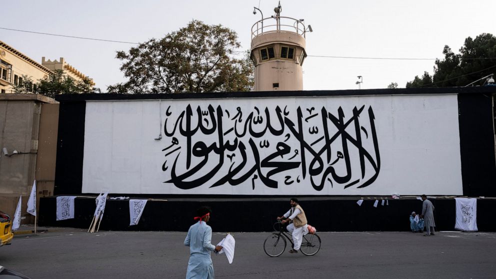 Taliban flag rises over seat of power on fateful anniversary