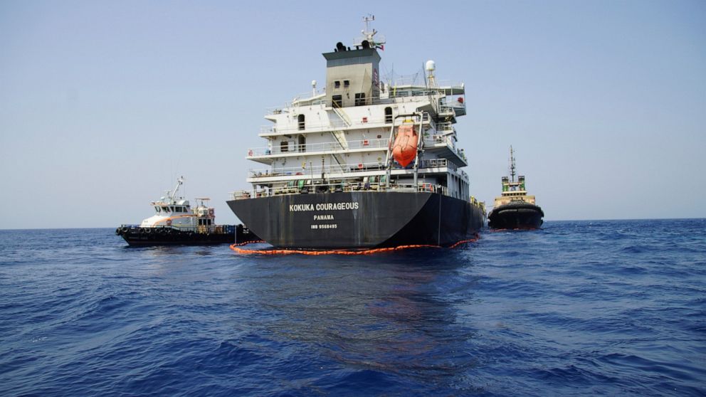 The Panama-flagged, Japanese owned oil tanker Kokuka Courageous, that the U.S. Navy says was damaged by a limpet mine, is anchored off Fujairah, United Arab Emirates, during a trip organized by the Navy for journalists, Wednesday, June 19, 2019. The 