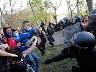 Madrid riot police keep protesters away from far-right rally
