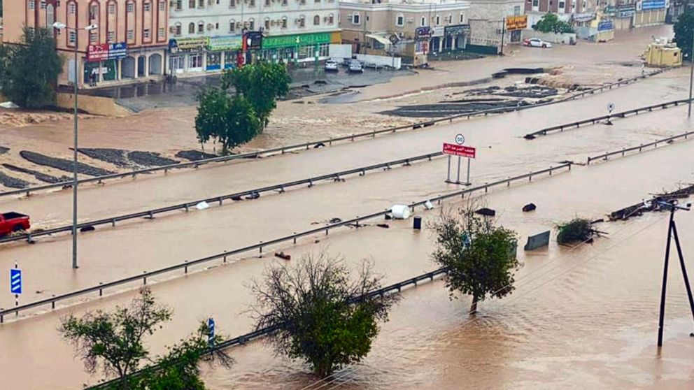 This photo released by Oman News Agency shows a flooded street of the Al Khaburah district after Cyclone Shaheen, in Oman, Monday, Oct. 4, 2021. The death toll from Cyclone Shaheen rose to over 10 Monday while other fishermen from Iran remained missi