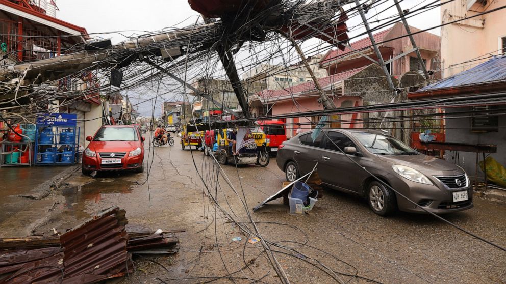 More than 200 dead after typhoon slams Philippines