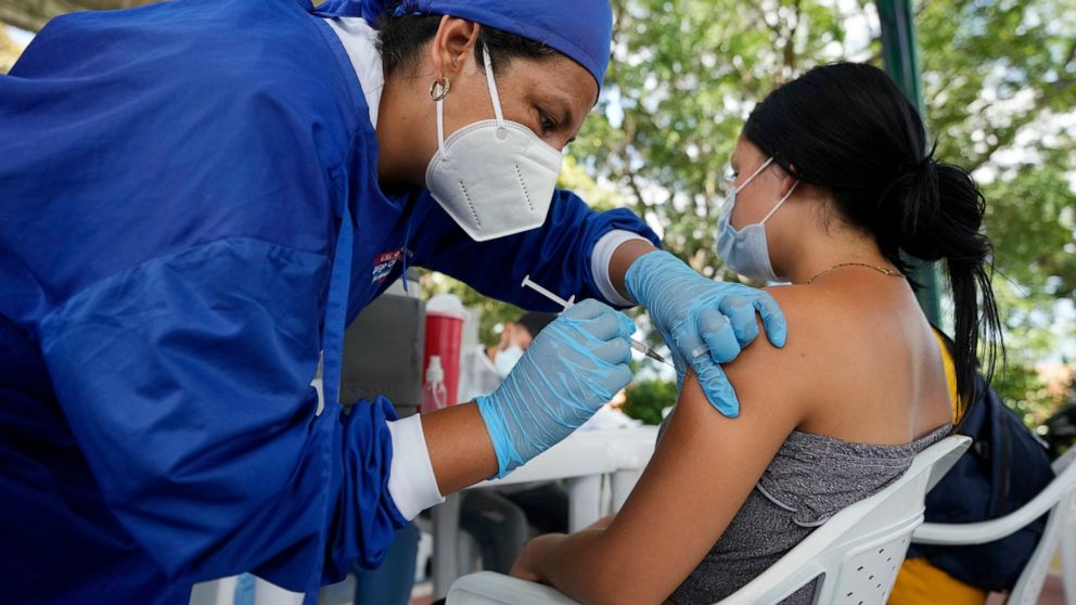 Venezuelans crossing into Colombia for coronavirus vaccines