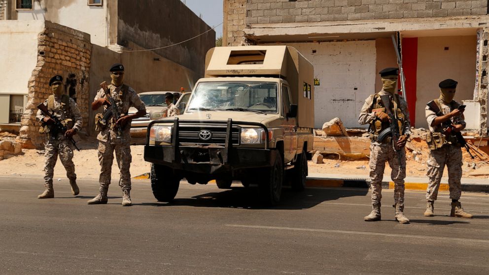 Libyan army forces and vehicles are stationed in a street in the country’s capital of Tripoli on Friday, July 22 2022. One of Libya’s rival governments on Friday called on militias to stop fighting, after clashes broke out in the country’s capital, T