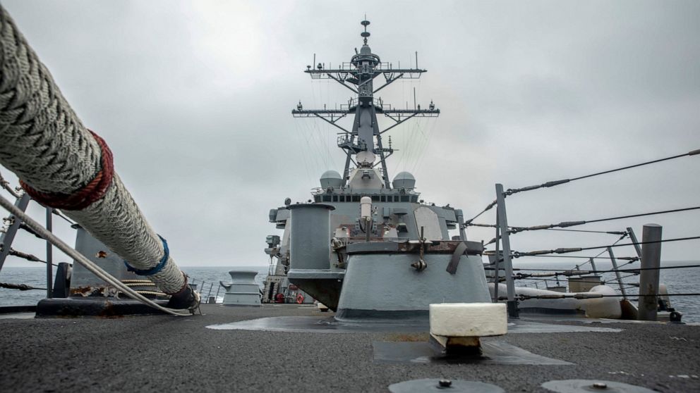 In this photo released by the U.S. Navy, the U.S. Arleigh Burke-class guided-missile destroyer USS Curtis Wilbur (DDG 54) conducts routine operations in the Taiwan Strait, May 18, 2021. China on Thursday, May 20, 2021, issued its second protest in as