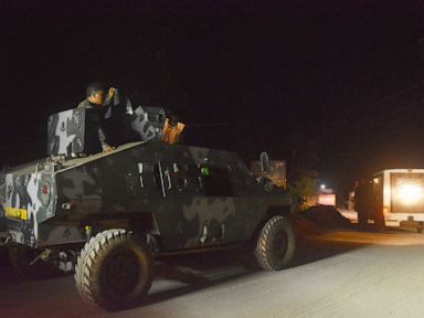 Philippine militants accused of beheading tourists surrender