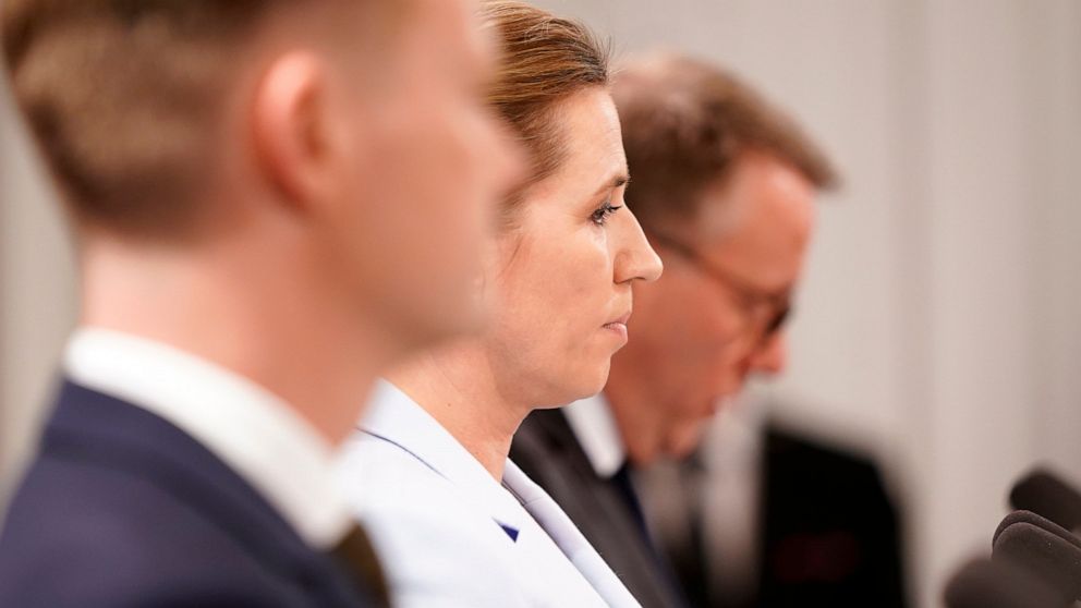 Denmark's Prime Minister Mette Frederiksen, center, Foreign Minister Jeppe Kofod, left and Minister of Defense Morten Boedskov, right, give a press conference on Denmark's cooperation with the United States, in the Prime Minister's Office at Christia