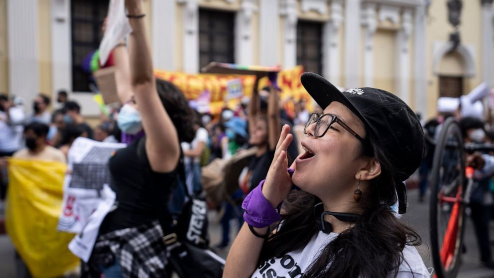 People gather in front of the Congress building to protest against a bill increasing sentences for women who terminate their pregnancies, prohibiting same-sex marriage and banning discussion of sexual diversity in schools, in Guatemala City, Saturday