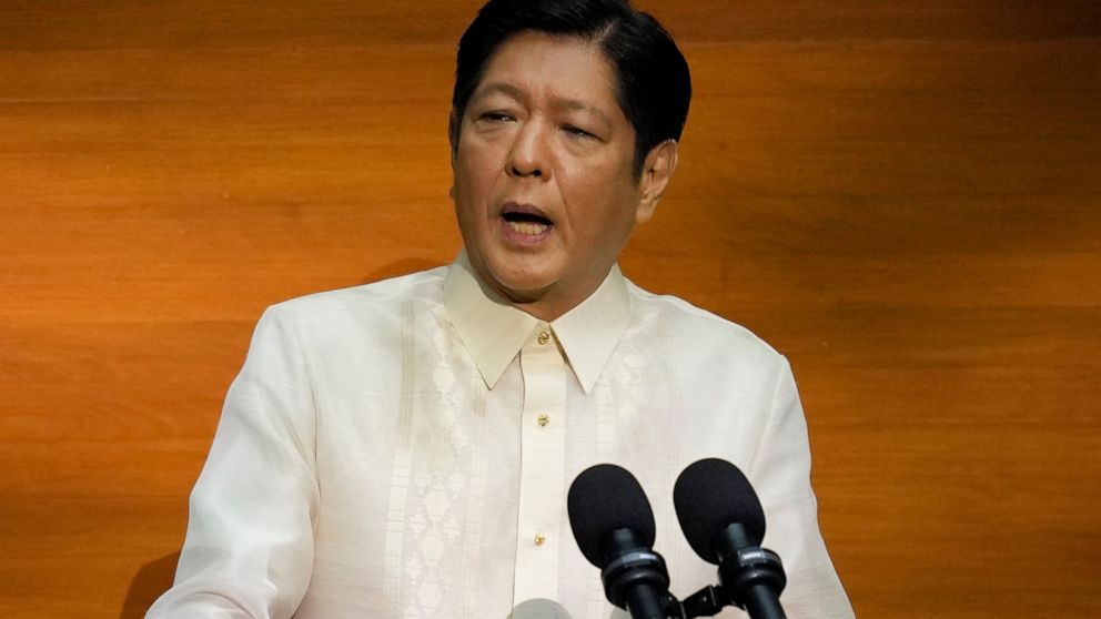 FILE - Philippine President Ferdinand Marcos Jr. delivers his first state of the nation address in, Quezon city, Philippines, July 25, 2022. Newly elected President Ferdinand Marcos Jr. said Monday Aug. 1, 2022 the Philippines has no plan to rejoin t