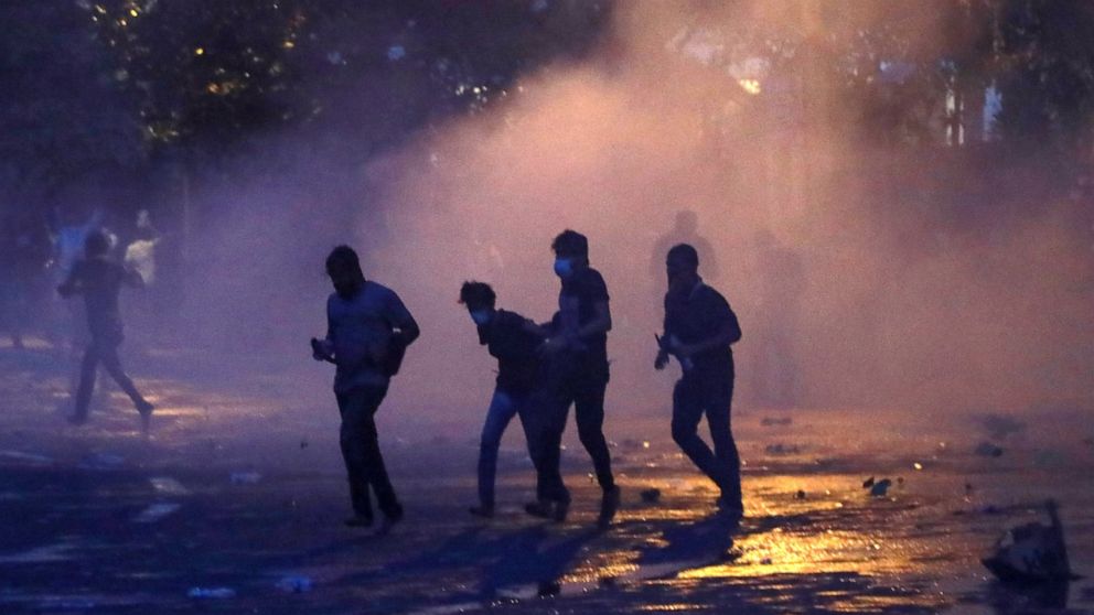 Police fires tear gas shells to disperse protesting students in Colombo, Sri Lanka, Friday, July 8, 2022. (AP Photo/Amitha Thennakoon)