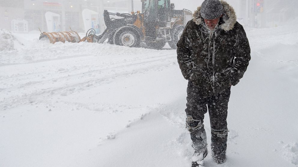 A pedestrian walks through heavy snow in St. John‚ Newfoundland on Friday, Jan. 17, 2020. The city has declared a state of emergency, ordering businesses closed and vehicles off the roads as blizzard conditions descend on the Newfoundland and Labrado