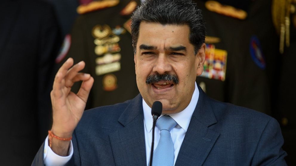 FILE - In this March 12, 2020 file photo, Venezuelan President Nicolas Maduro speaks at the Miraflores presidential palace in Caracas, Venezuela. The Trump administration pushed back Tuesday, Sept. 2, 2020 on Maduro, saying he deserves no praise for 