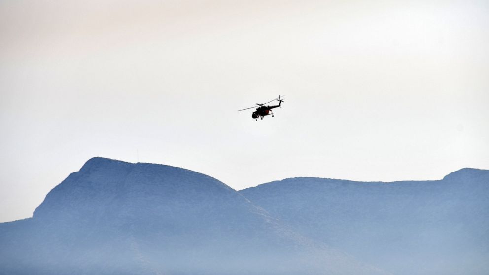 Firefighting helicopter crashes off Greek island; 2 dead