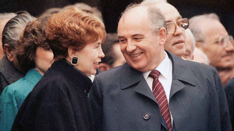FILE - Soviet leader Mikhail Gorbachev and his wife Raisa in East Germany during youth rally in East Berlin, Germany, April 18, 1986. When Mikhail Gorbachev is buried Saturday at Moscow's Novodevichy Cemetery, he will once again be next to his wife, 