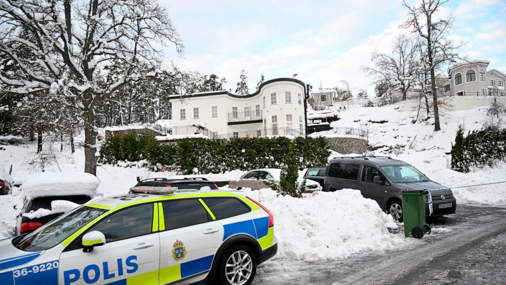 A police car is parked outside a house where the Swedish Security Service allegedly arrested two people on suspicions of espionage in a predawn operation in Stockholm, Tuesday, Nov. 22 2022. The authorities gave few details about the case, but Swedis