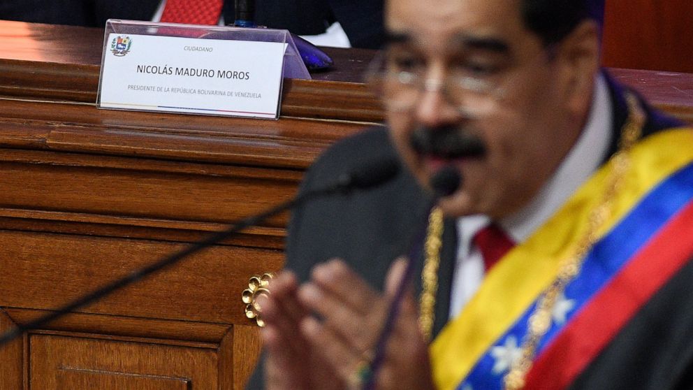 Venezuelan President Nicolas Maduro gives his annual address to the nation inside the chamber of the Constituent Assembly on the grounds of the National Assembly in Caracas, Venezuela, Tuesday, Jan. 14, 2020. (AP Photo/Matias Delacroix)