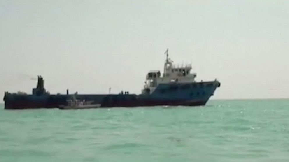 This undated image made from a video provided by the IRGC/IRIB shows a ship in the Persian Gulf. Iranian forces seized the ship, which it suspected of carrying smuggled fuel, state media reported Sunday, Aug. 4, 2019, marking the Revolutionary Guard'