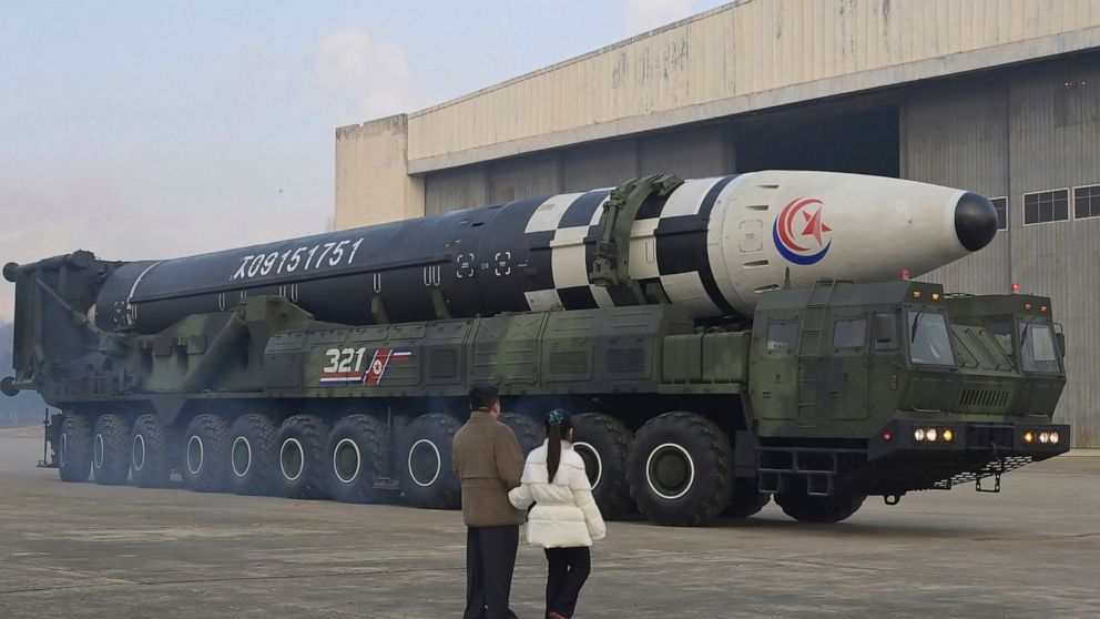 This photo provided on Nov. 19, 2022, by the North Korean government shows North Korean leader Kim Jong Un, left, and his daughter inspect what it says a Hwasong-17 intercontinental ballistic missile at Pyongyang International Airport in Pyongyang, N