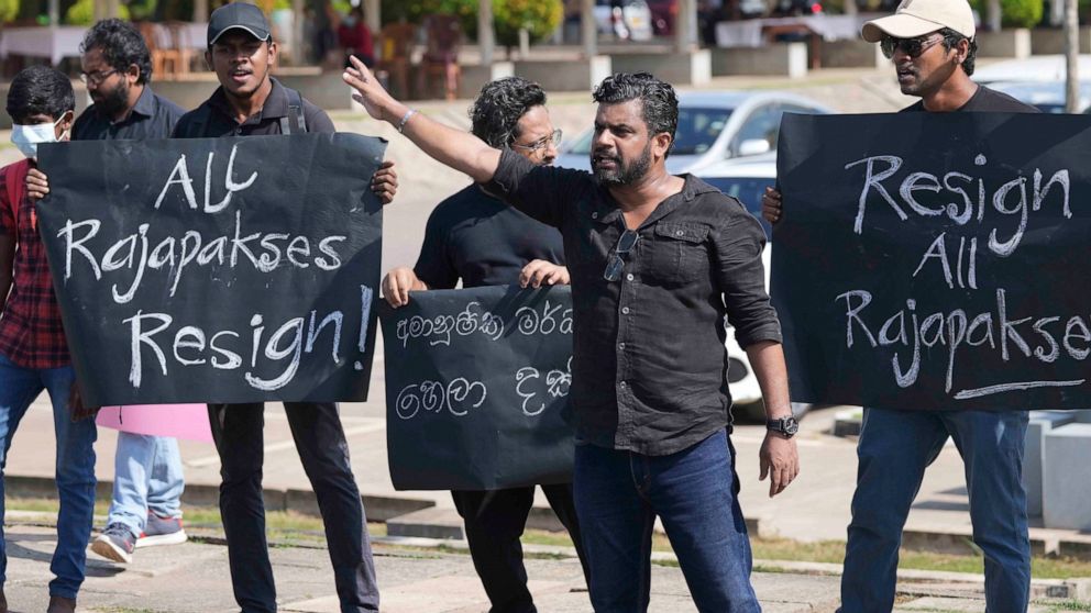 FILE - Sri Lankans protest demanding president Gotabaya Rajapaksa resign in Colombo, Sri Lanka, April 4, 2022. With one brother president, another prime minister and three more family members cabinet ministers, it appeared that the Rajapaksa clan had