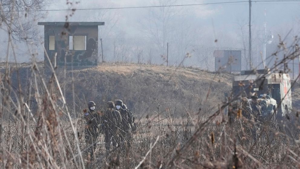 N. Korea confirms missile tests as Kim visits munitions site