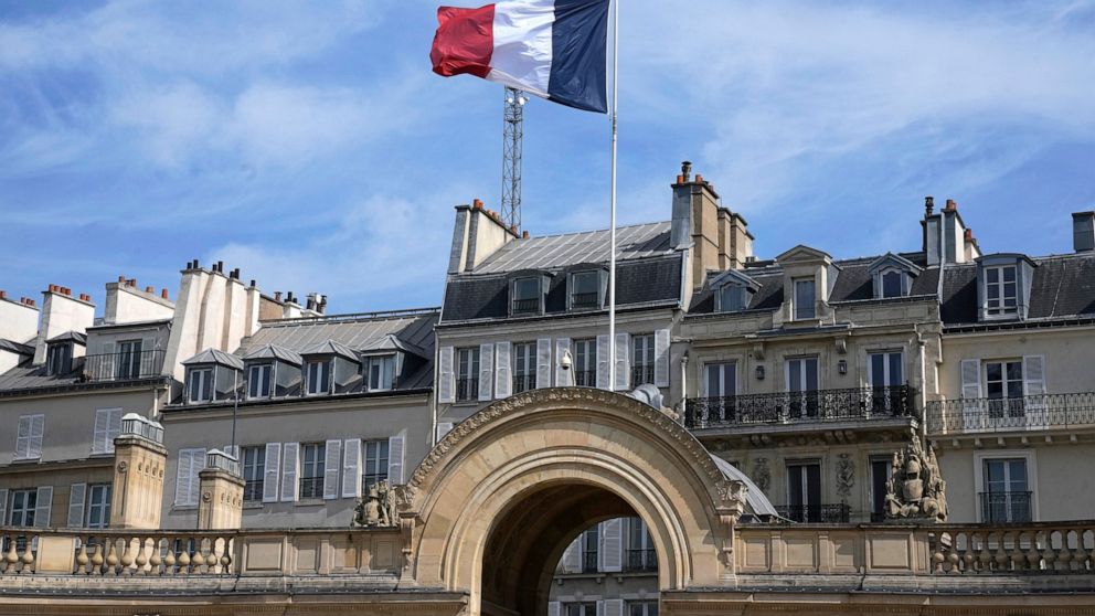 The French flag float at the presidential Elysee palace during the weekly cabinet meeting, Wednesday, April 20, 2022 in Paris. French President Emmanuel Macron is facing off against far-right challenger Marine Le Pen in France's April 24 presidential