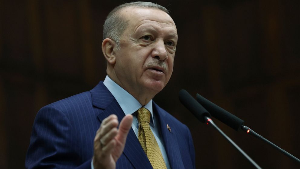 Turkey's President Recep Tayyip Erdogan speaks to his ruling party's lawmakers, in Ankara, Turkey, Wednesday, Dec. 23. 2020. Turkey’s president has lashed out against the European Court of Human Rights after its ruling that Turkey must immediately re