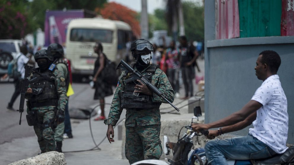Armed forces secure the area of ​​state offices of Port-au-Prince, Haiti, Monday, July 11, 2022. Radio TV Caraibe, a popular radio station in Haiti announced that it would stop broadcasting for one week to protest widespread violence in the capital. 