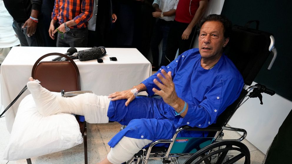 Former Pakistani Prime Minister Imran Khan speaks during a news conference in Shaukat Khanum hospital, where is being treated for a gunshot wound in Lahore, Pakistan, Friday, Nov. 4, 2022. Khan's protest march and rallies were peaceful until the afte