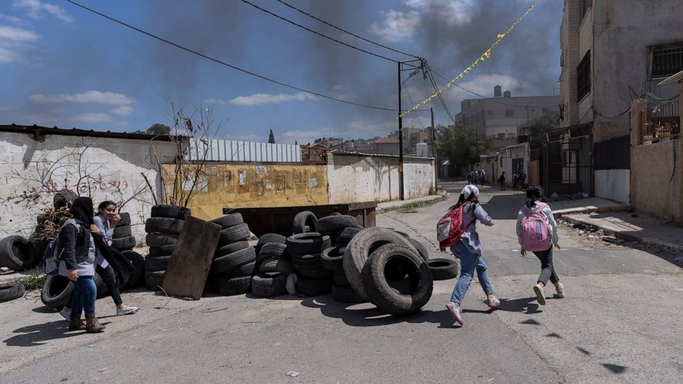 Palestinians in Jenin evoke painful past as violence flares