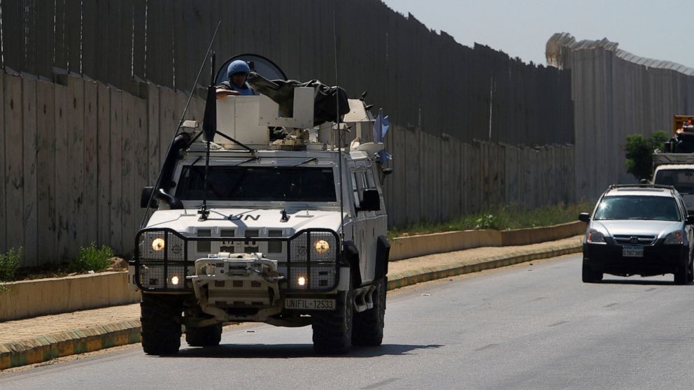 Spanish U.N peacekeepers patrol the Lebanese side of the Lebanese-Israeli border in the southern village of Kfar Kila, Lebanon, Monday, Aug. 26, 2019. Lebanon's state-run National News Agency said Monday that Israel's air force attacked a Palestinian