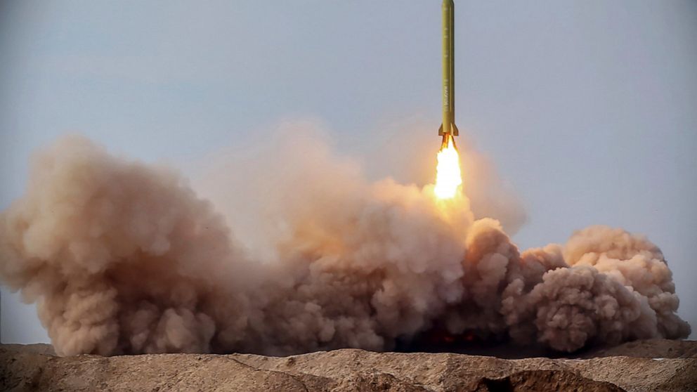 FILE - In this file photo released Jan. 16, 2021, by the Iranian Revolutionary Guard, a missile is launched in a drill in Iran. On Tuesday, Jan. 26, 2021, Iran warned the Biden administration that it will not have an indefinite time period to rejoin 