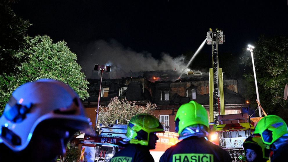 Fire fighters battle a fire at the Alzheimer centre in Roztoky, near Prague, Czech Republic, Wednesday, June 1, 2022. The devastating fire left two dead and more than 50 injured including two in a serious condition. (Michal Kamaryt/CTK/ via AP)