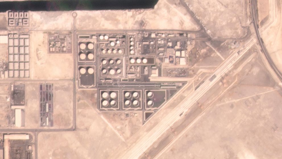In this satellite image provided by Planet Labs PBC, an Abu Dhabi National Oil Co. fuel depot in the Mussafah neighborhood of Abu Dhabi, United Arab Emirates, is seen Saturday, Jan. 15, 2022, before being targeted in an attack days later. A drone att
