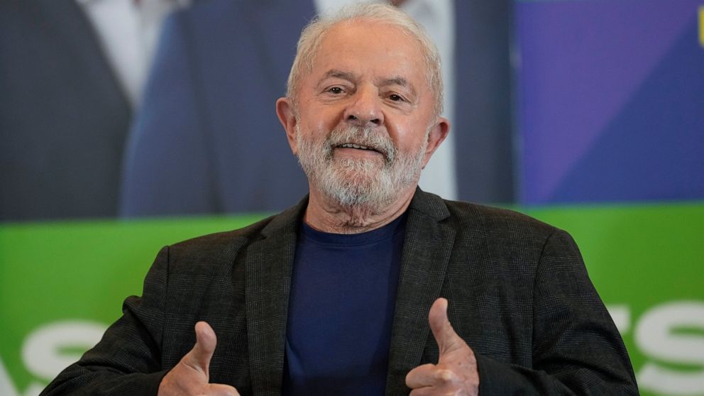 Brazil's former President Luiz Inacio "Lula" da Silva, who is running for reelection, flashes thumbs up after giving a statement to the media in Sao Paulo, Brazil, Monday, Oct. 3, 2022. Da Silva will face Brazilian President Jair Bolsonaro in a presi