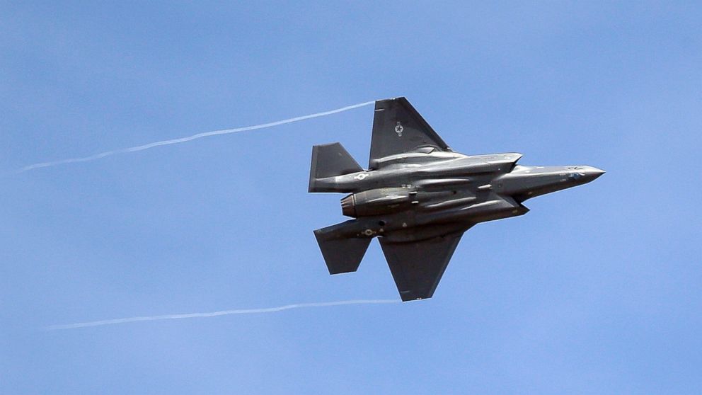 FILE - In this Sept. 2, 2015, file photo, an F-35 jet flies over its new operational base at Hill Air Force Base, in northern Utah. (AP Photo/Rick Bowmer, File)