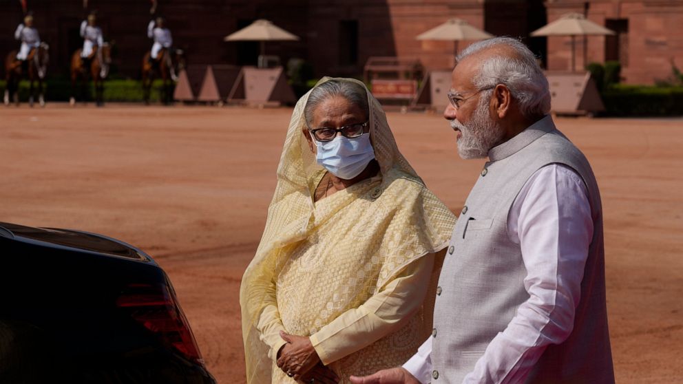 Indian Prime Minister Narendra Modi, right, talks with his Bangladeshi counterpart Sheikh Hasin during her ceremonial reception at the Indian presidential palace in New Delhi, India , Tuesday, Sept. 6, 2022. Bangladesh's prime minister was welcomed t