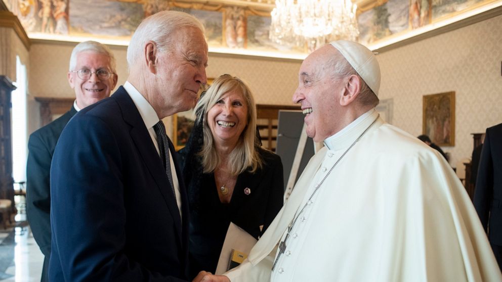US President Joe Biden, left, shakes hands with Pope Francis as they meet at the Vatican, Friday, Oct. 29, 2021. President Joe Biden is set to meet with Pope Francis on Friday at the Vatican, where the world’s two most notable Roman Catholics plan to