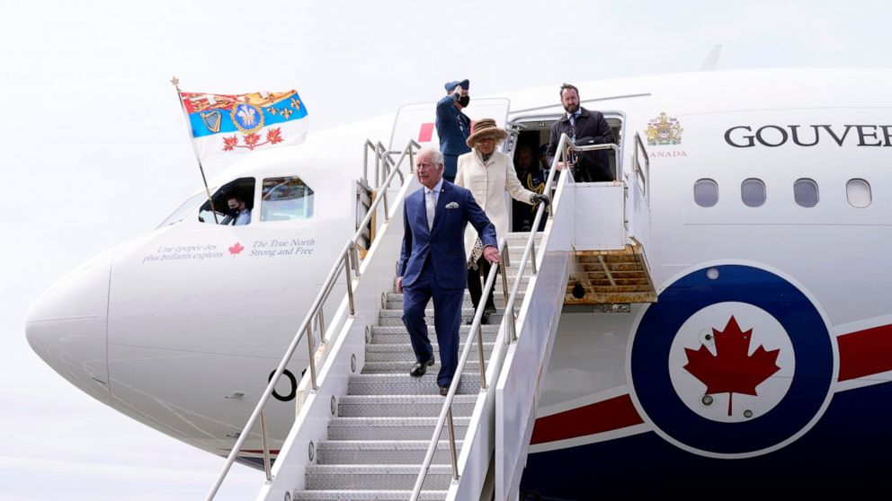 Prince Charles and Camilla, Duchess of Cornwall, arrive in St. John's to begin a three-day Canadian tour, Tuesday, May 17, 2022. (Paul Chiasson/The Canadian Press via AP)